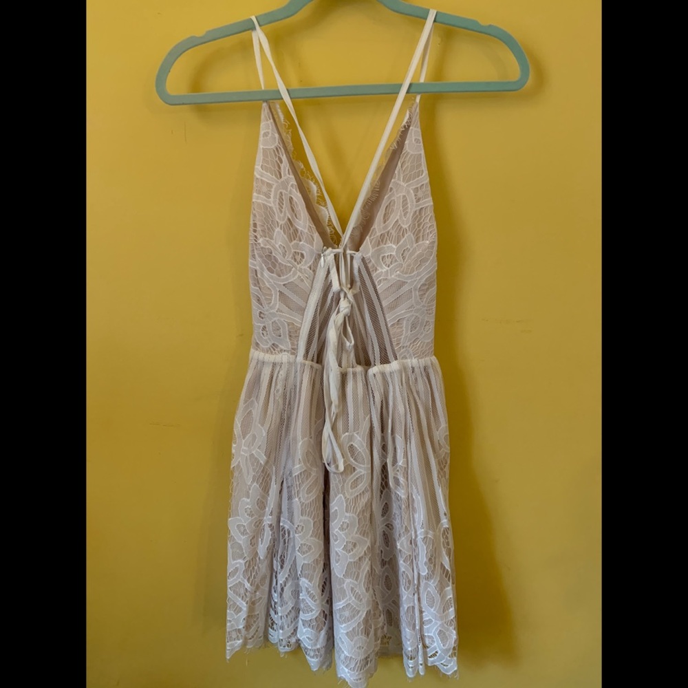 Strappy lace-up white mini dress